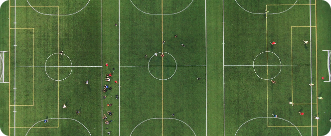 Top-down view of three football pitches side by side