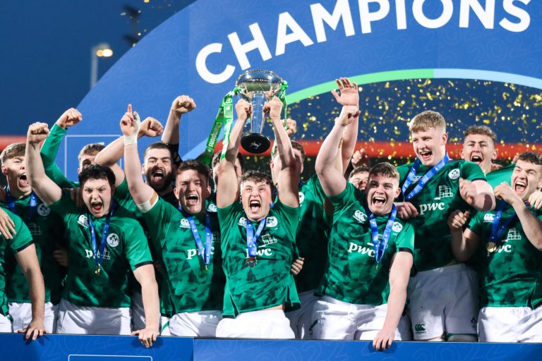 Ireland Under-20 rugby team lifting the Six Nations trophy